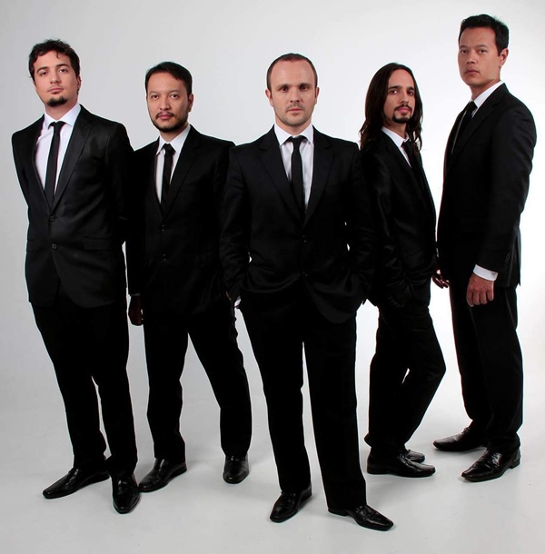 Da esquerda para direita: Caio Antunes, Rodrigo Karashima, Denis Oliveira, Marcelo Duarte e Igor Karashima são os integrantes da Let It Beatles (Divulgação)