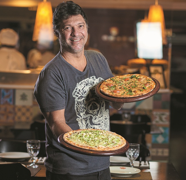 Sucesso saboroso: o empresário Robson Cunha responde pela afinação da parte operacional e administrativa da pizzaria (Raimundo Sampaio/Esp. Encontro/DA Press)