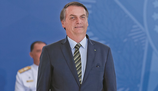 Jair Bolsonaro na foto
oficial da Presidência
da República: o 38º
presidente do Brasil
tem um estilo muito
próprio de governar (Carolina Antunes/PR/Divulgação)